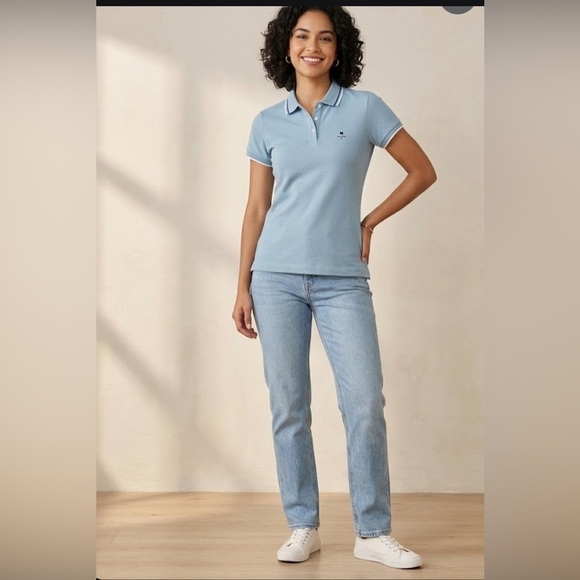 Giordano Tops - NWOT Classic Light Blue Polo Top with Subtle Embroidered Logo..